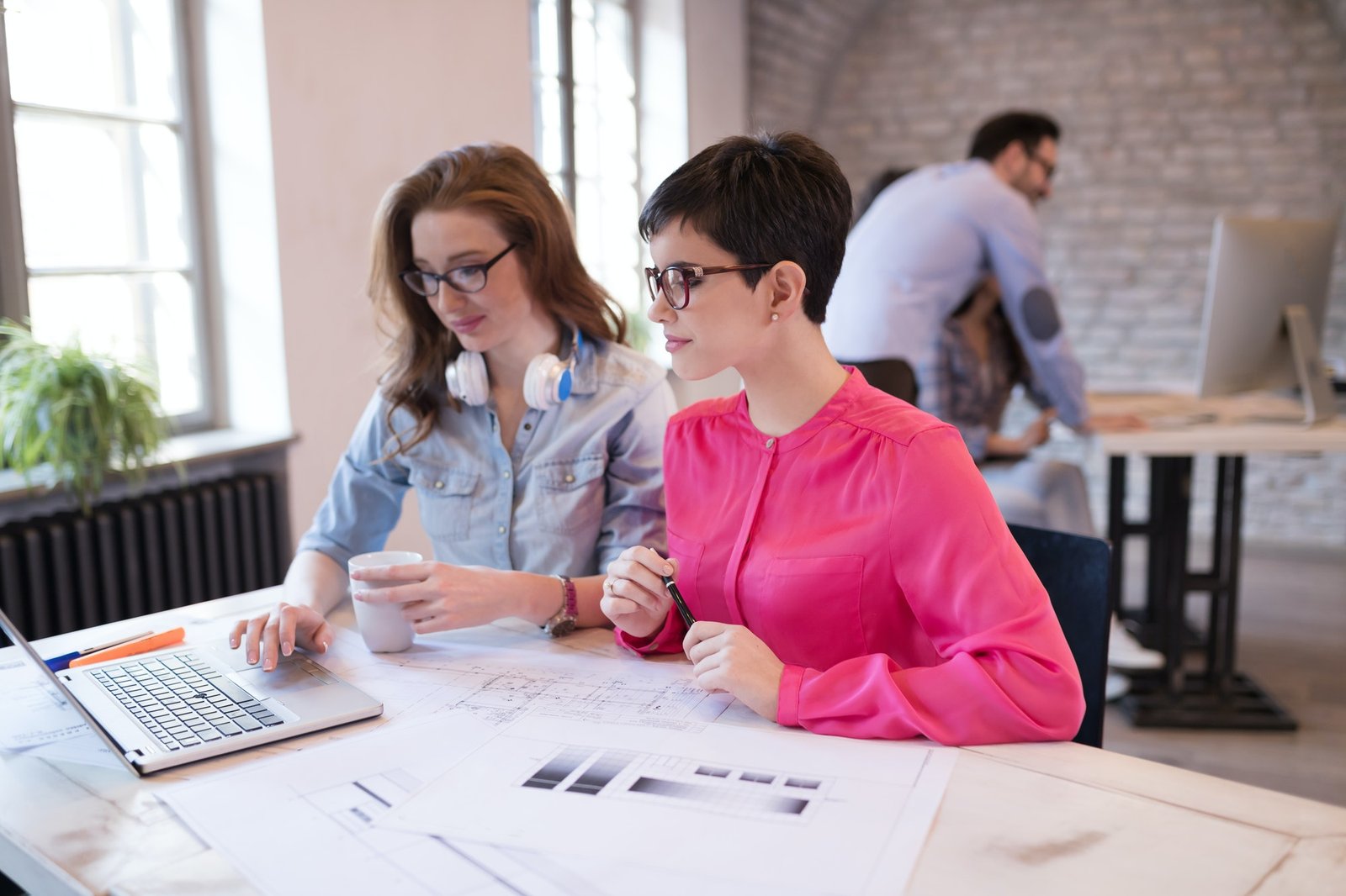 business coworkers discussing new ideas and brainstorming in office