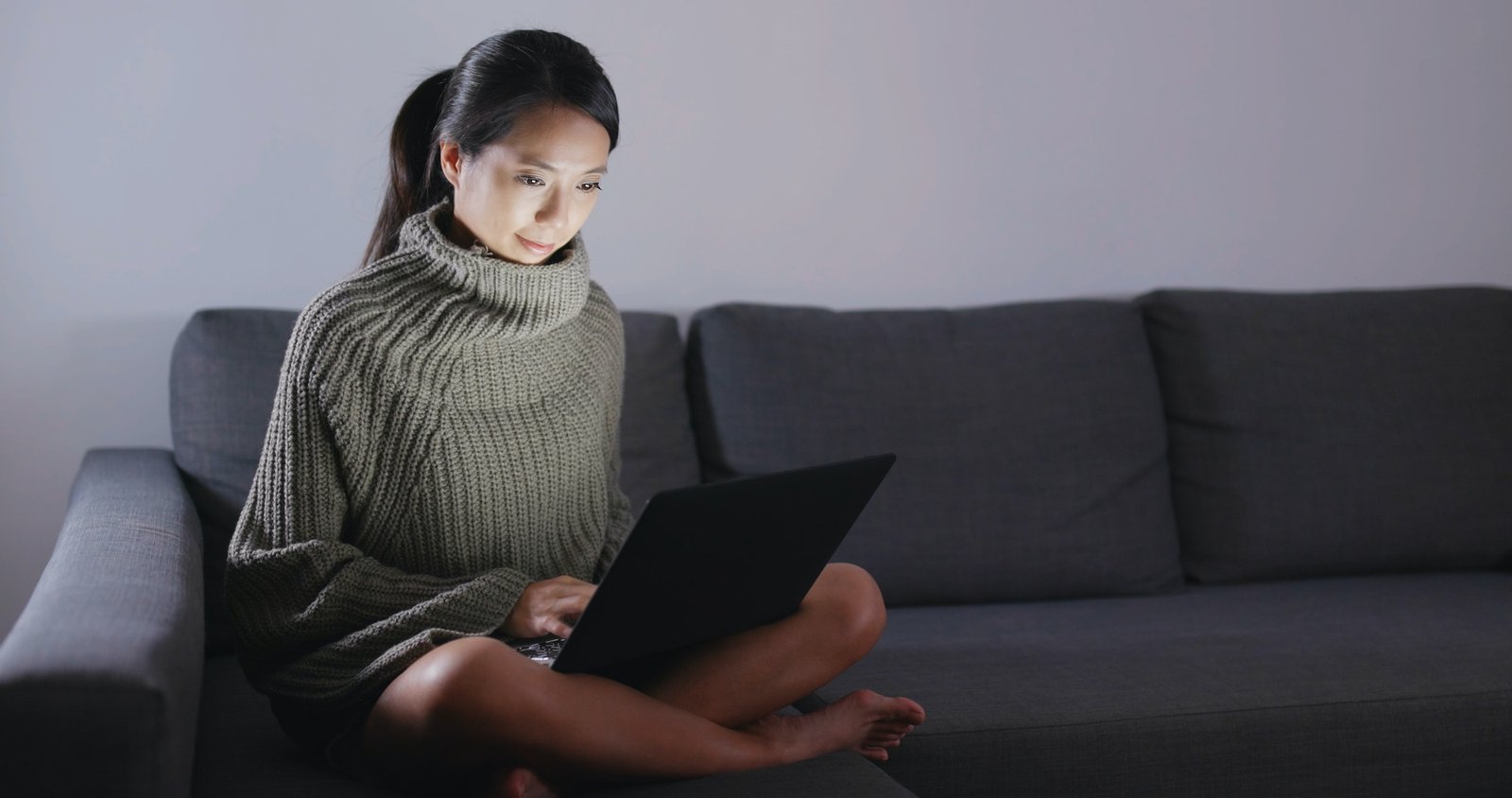 woman working on laptop computer